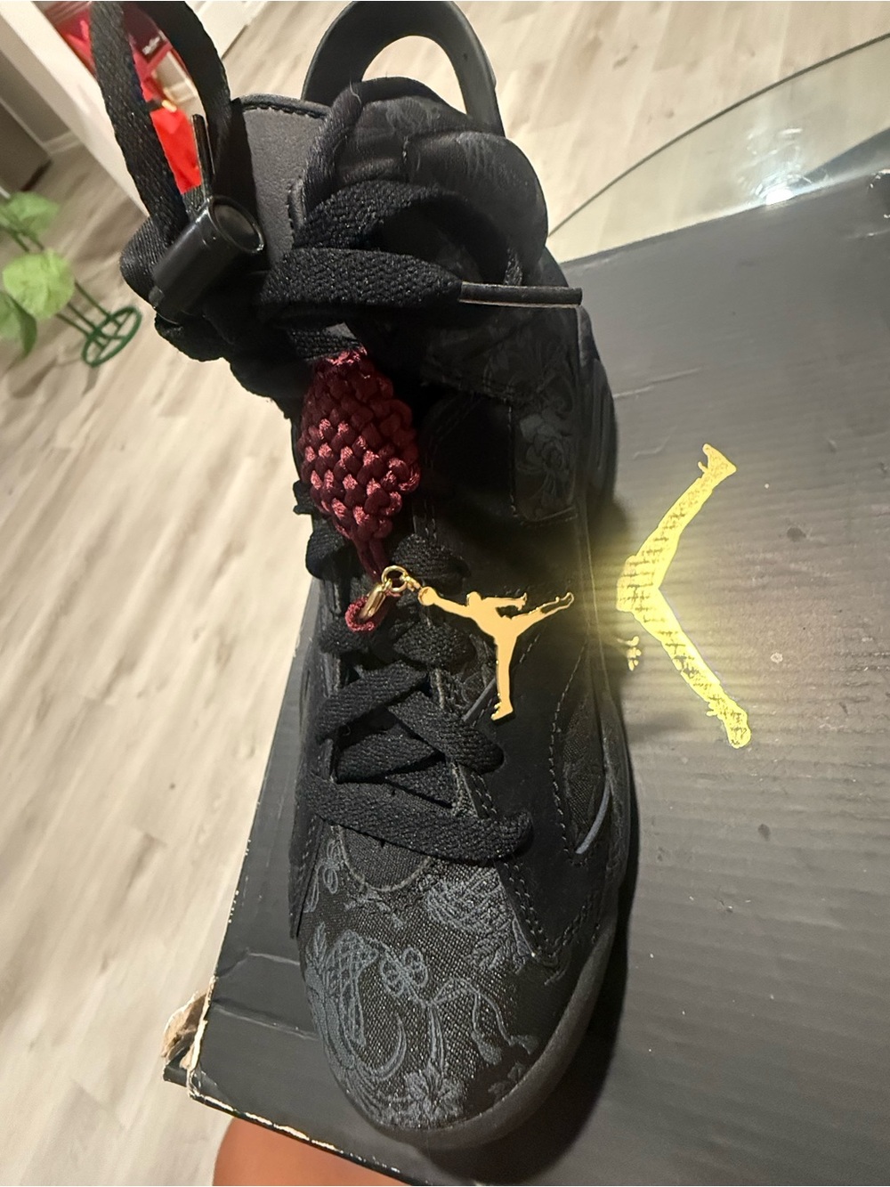 Jordan Women’s Black Sneaker with Burgundy Lace Accent